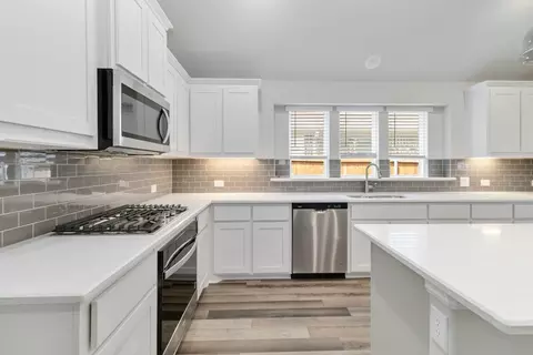 Kitchen - 601 Trinity St, Van Alstyne, TX 75495 photo 4 of 7