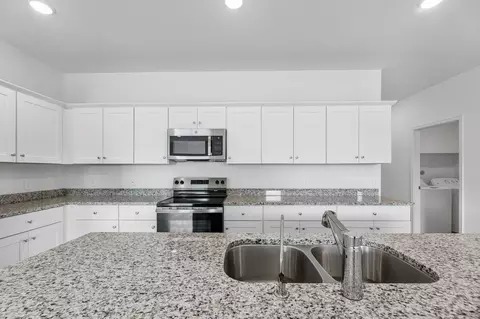 Kitchen - 10858 Curving Creek Loop, Parrish, FL 34219 photo 2 of 3