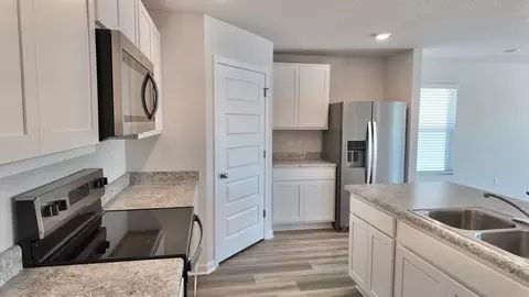 Kitchen - 6383 June Bug Dr, Milton, FL 32583 photo 4 of 8