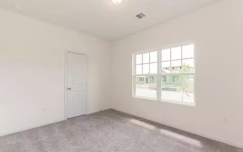 Bedroom - 110 Olympic Park Dr, Kyle, TX 78640 photo 3 of 9