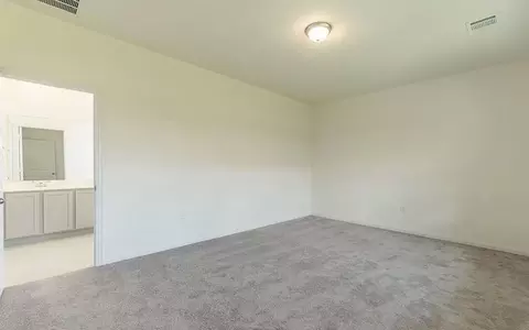 Bedroom - 110 Olympic Park Dr, Kyle, TX 78640 photo 1 of 9