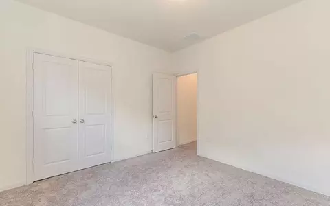 Bedroom - 110 Olympic Park Dr, Kyle, TX 78640 photo 2 of 9