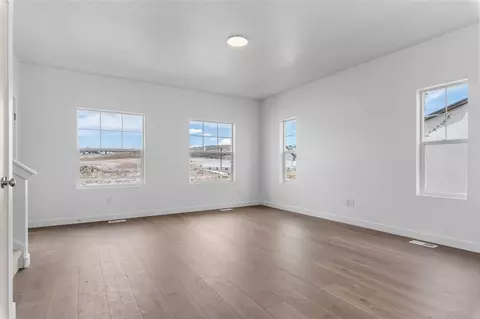 Living - 1807 E Sierra Pines Dr, Eagle Mountain, UT 84005 photo 3 of 7