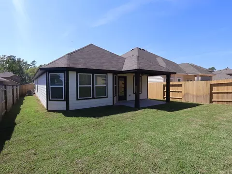 Exterior - 613 Falling Cave Dr, Willis, TX 77378 photo 5 of 9