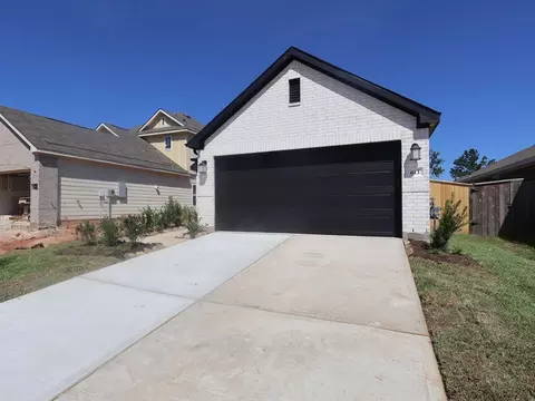 Exterior - 613 Falling Cave Dr, Willis, TX 77378 photo 3 of 9
