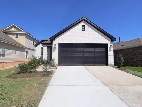 Exterior - 613 Falling Cave Dr, Willis, TX 77378 photo 2 of 9