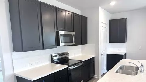 Kitchen - 709 Red Wolf Dr, Jarrell, TX 76537 photo 3 of 5