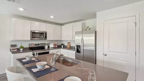 Kitchen - 13610 Fenwick Stream Dr, Wimauma, FL 33598 photo 3 of 9
