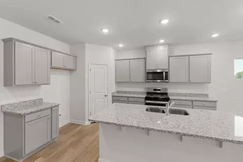 Kitchen - 212 Armorial Ct, Willow Spring, NC 27592 photo 2 of 2