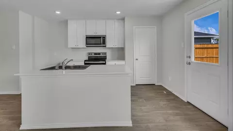 Kitchen - 2207 Gentle Rain Dr, Luling, TX 78648 photo 2 of 7