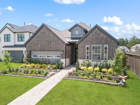 Exterior - 411 Aztec Cave Dr, New Caney, TX 77357 photo 1 of 2