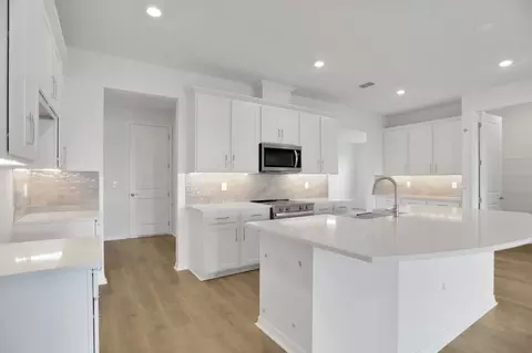 Kitchen - 7414 Sea Manatee St, Parrish, FL 34219 photo 2 of 3