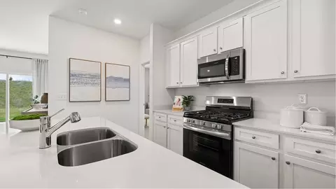 Kitchen - 310 Mahan Dr, Perry, GA 31069 photo 3 of 6