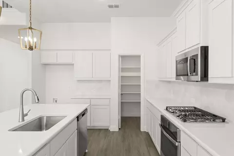 Kitchen - 601 Trinity St, Van Alstyne, TX 75495 photo 3 of 5