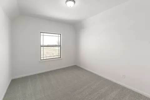 Bedroom - 601 Trinity St, Van Alstyne, TX 75495 photo 5 of 6