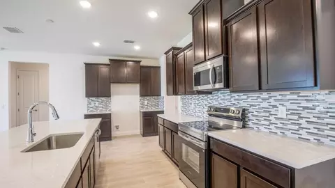 Kitchen - 10238 Hexam Rd, Weeki Wachee, FL 34613 photo 2 of 3