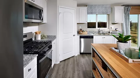 Kitchen - 18786 Hampton Ln, Adelanto, CA 92301 photo 2 of 6
