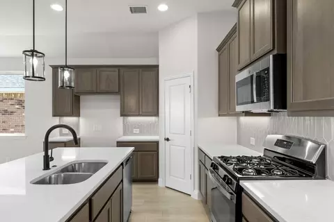 Kitchen - 1101 Trinity Rail Rd, Anna, TX 75409 photo 6 of 8