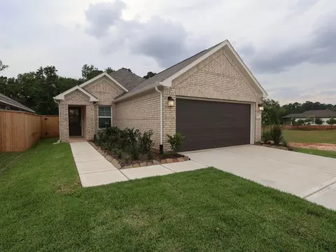682 Falling Cave Dr, Willis, TX 77378