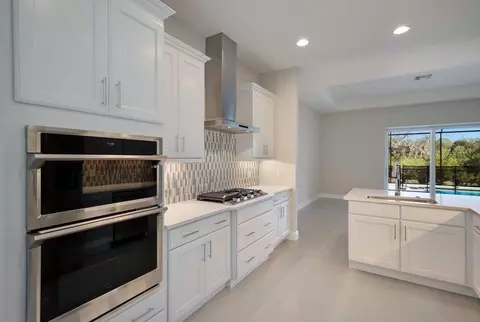 Kitchen - 12390 Cedar Pass Trl, Parrish, FL 34219 photo 2 of 11