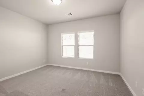 Bedroom - 12048 Moonlight Path Dr, Conroe, TX 77304 photo 2 of 9