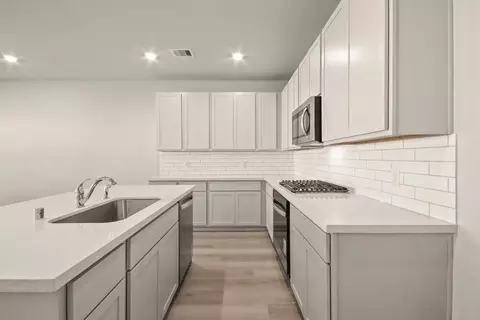 Kitchen - 12048 Moonlight Path Dr, Conroe, TX 77304 photo 2 of 6