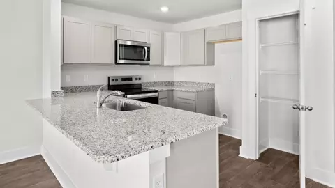 Kitchen - 5460 Mistiflower St, Leland, NC 28451 photo 1 of 6