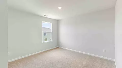Bedroom - 1710 Blacktip Dr SE, Winnabow, NC 28479 photo 10 of 16