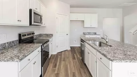 Kitchen - 1710 Blacktip Dr SE, Winnabow, NC 28479 photo 4 of 8
