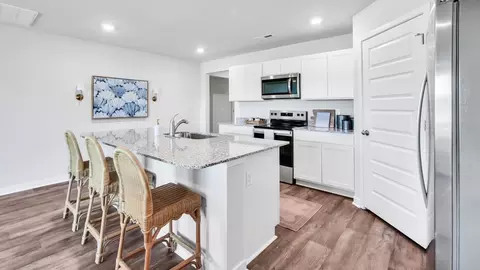 Kitchen - 1710 Blacktip Dr SE, Winnabow, NC 28479 photo 5 of 8