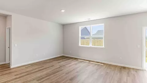 Living - 1710 Blacktip Dr SE, Winnabow, NC 28479 photo 3 of 5