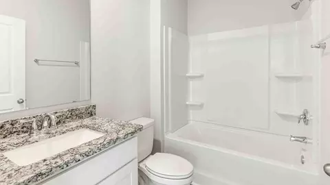 Bath - 1710 Blacktip Dr SE, Winnabow, NC 28479 photo 1 of 6
