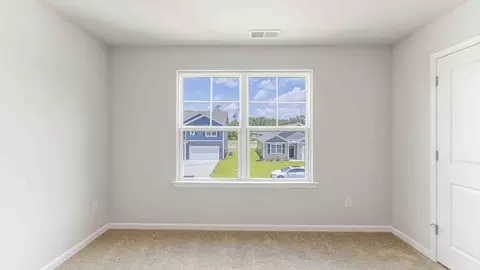 Bedroom - 1710 Blacktip Dr SE, Winnabow, NC 28479 photo 12 of 16