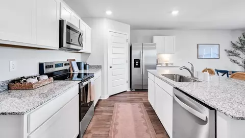 Kitchen - 1710 Blacktip Dr SE, Winnabow, NC 28479 photo 6 of 8