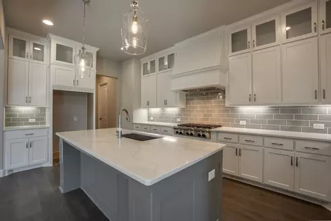 Kitchen - 910 Shooting Star Dr, Prosper, TX 75078 photo 3 of 11