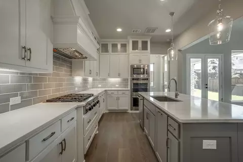 Kitchen - 910 Shooting Star Dr, Prosper, TX 75078 photo 4 of 11