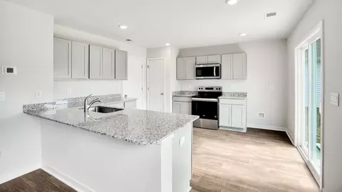 Kitchen - 1273 Skystone Loop NE #LOT 19, Supply, NC 28462 photo 1 of 10