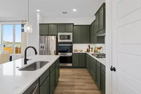 Kitchen - 709 Rustic Ridge Dr, Lavon, TX 75166 photo 6 of 7