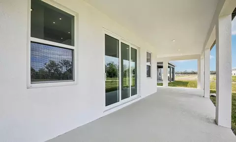 Exterior - 10164 Hidden Hammock Loop, Parrish, FL 34219 photo 3 of 7