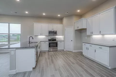 Kitchen - 8303 Greentree Dr, Lenexa, KS 66227 photo 2 of 5