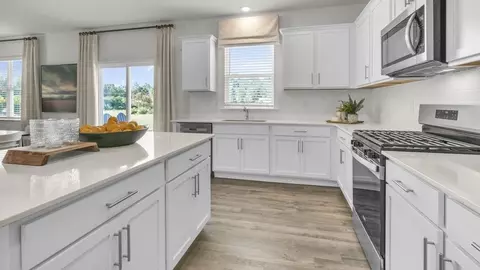 Kitchen - 941 Cattle Dr, Wake Forest, NC 27587 photo 3 of 13