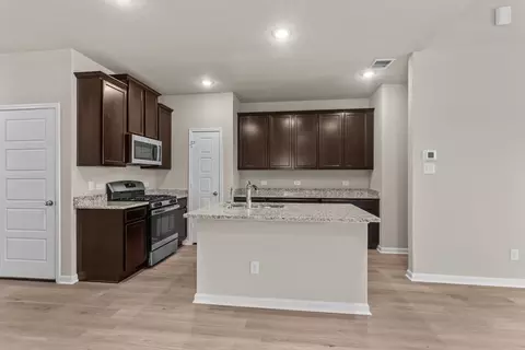 Kitchen - 4802 Rayos Ter, Von Ormy, TX 78073 photo 1 of 3