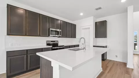 Kitchen - 205 Red Wolf Dr, Jarrell, TX 76537 photo 1 of 2