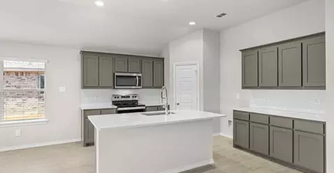 Kitchen - 1620 Macadamia Ct, Aubrey, TX 76227 photo 2 of 3