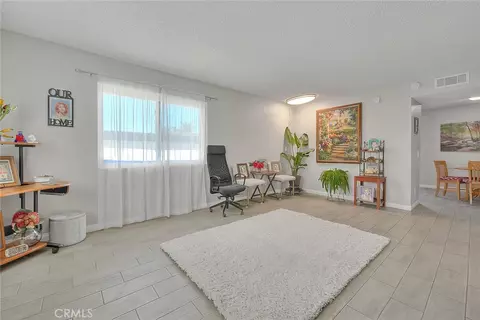 Living - 12836 12th St #73, Chino, CA 91710 photo 2 of 3