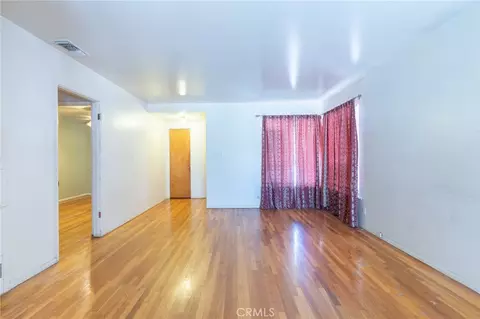 Living - 10243 Saratoga Ave, Montclair, CA 91763 photo 3 of 7