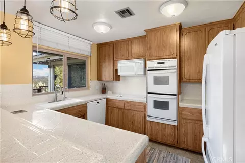 Kitchen - 5495 Summit Dr, Wrightwood, CA 92397 photo 1 of 6