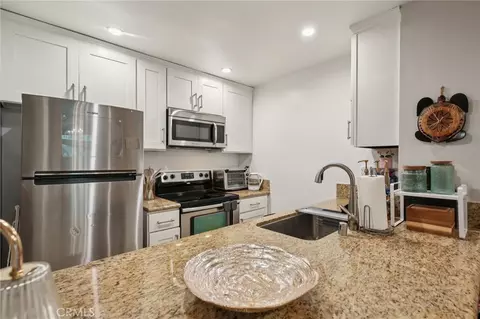 Kitchen - 7890 E Spring St #16P, Long Beach, CA 90815 photo 2 of 2