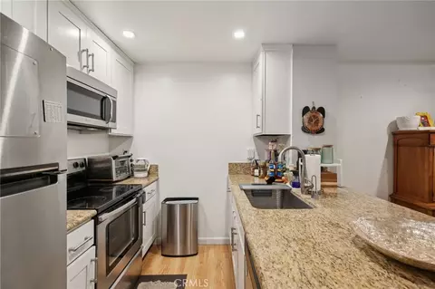 Kitchen - 7890 E Spring St #16P, Long Beach, CA 90815 photo 1 of 2