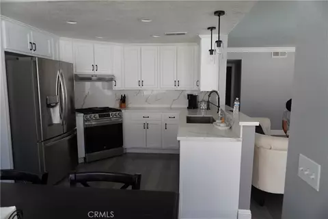 Kitchen - 10406 Sandstone Ct, Mentone, CA 92359 photo 1 of 7